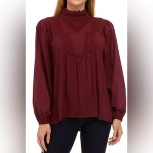 Cupio
Women's Blouson Sleeve Mock Neck Eyelet blouse. Long sleeve, size XS.